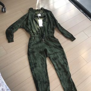 Lezat- brand new with tags. XS overall.